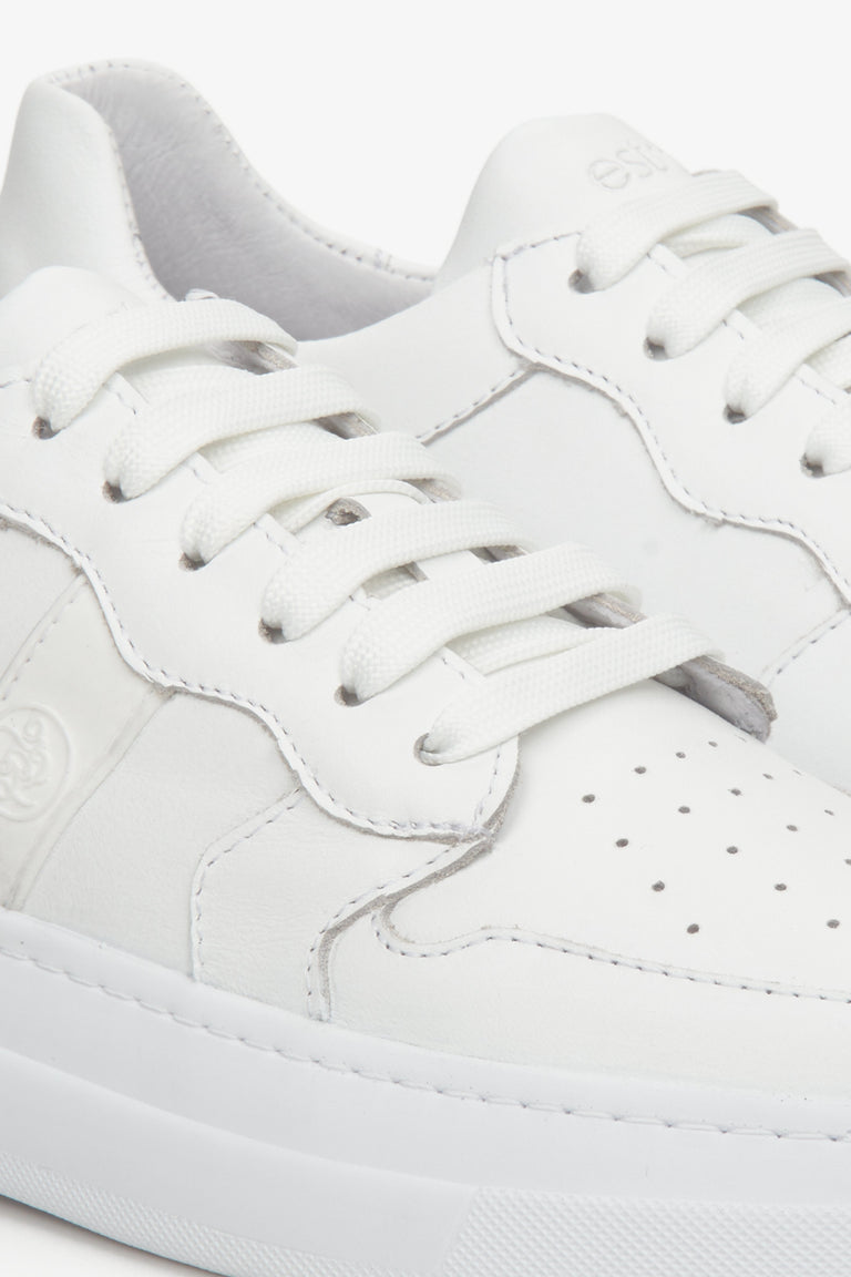 Women's natural leather lace-up sneakers in white - close-up on the details.