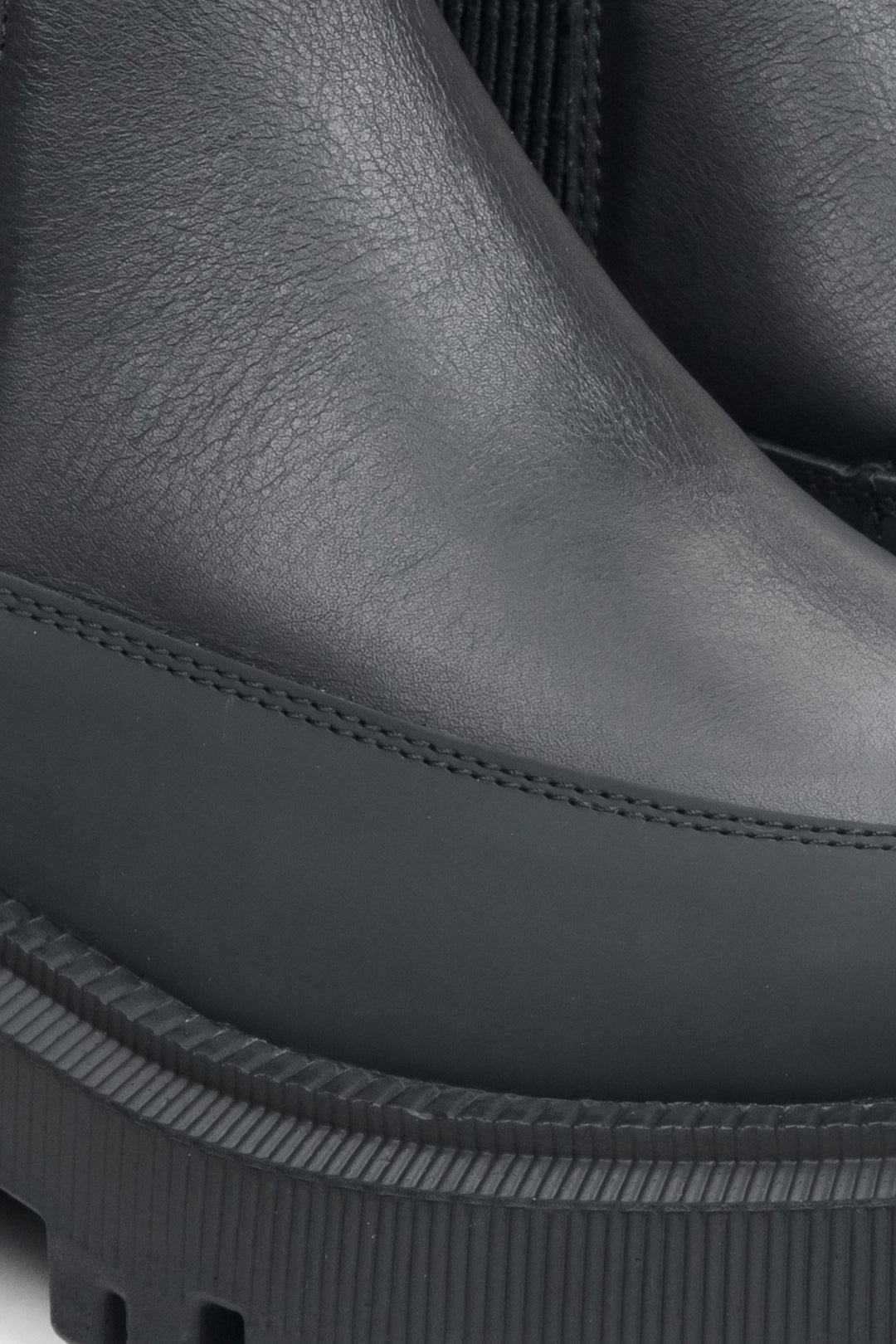 Black women's ankle boots - close-up on details.