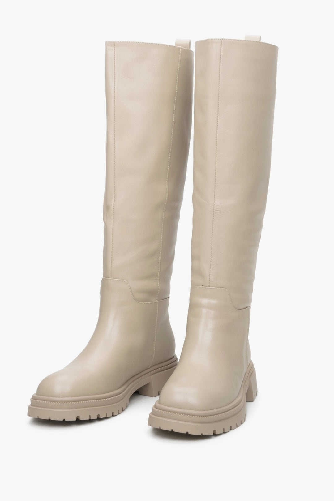 Women's light beige leather high boots with elastic shaft by Estro.