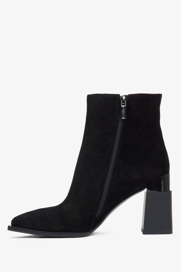 Women's black ankle boots with a high heel made of genuine velour and insulation by Estro - side profile of the shoe.