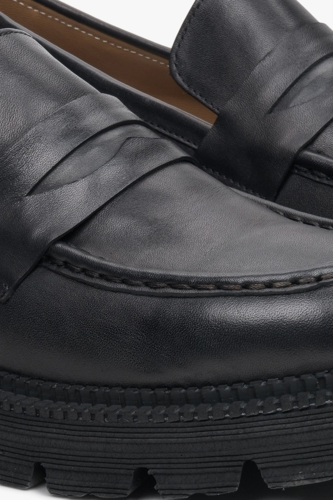 Women's black loafers made of genuine leather by Estro.