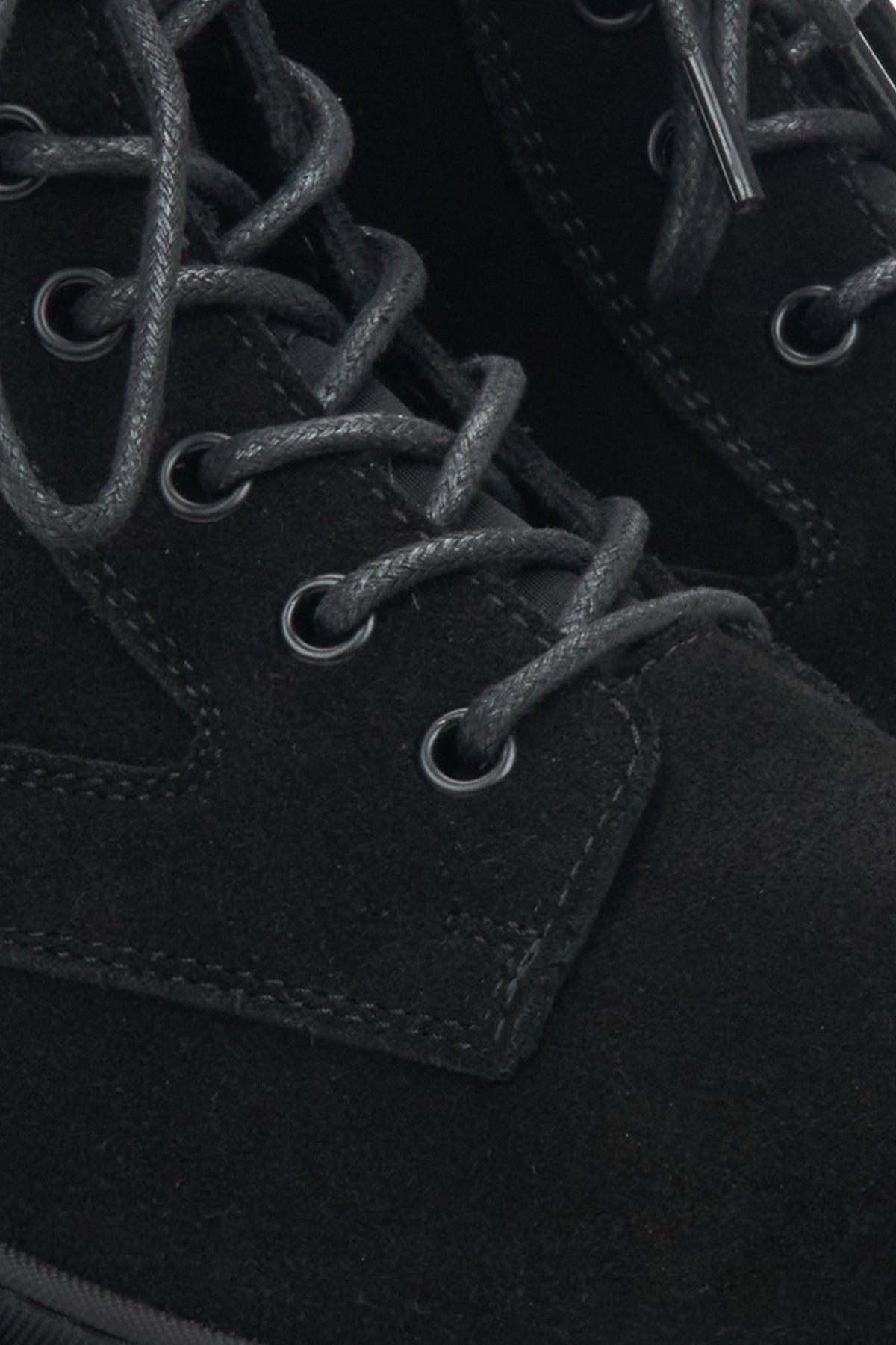 Black velour women's ankle boots by Estro - close-up of details.