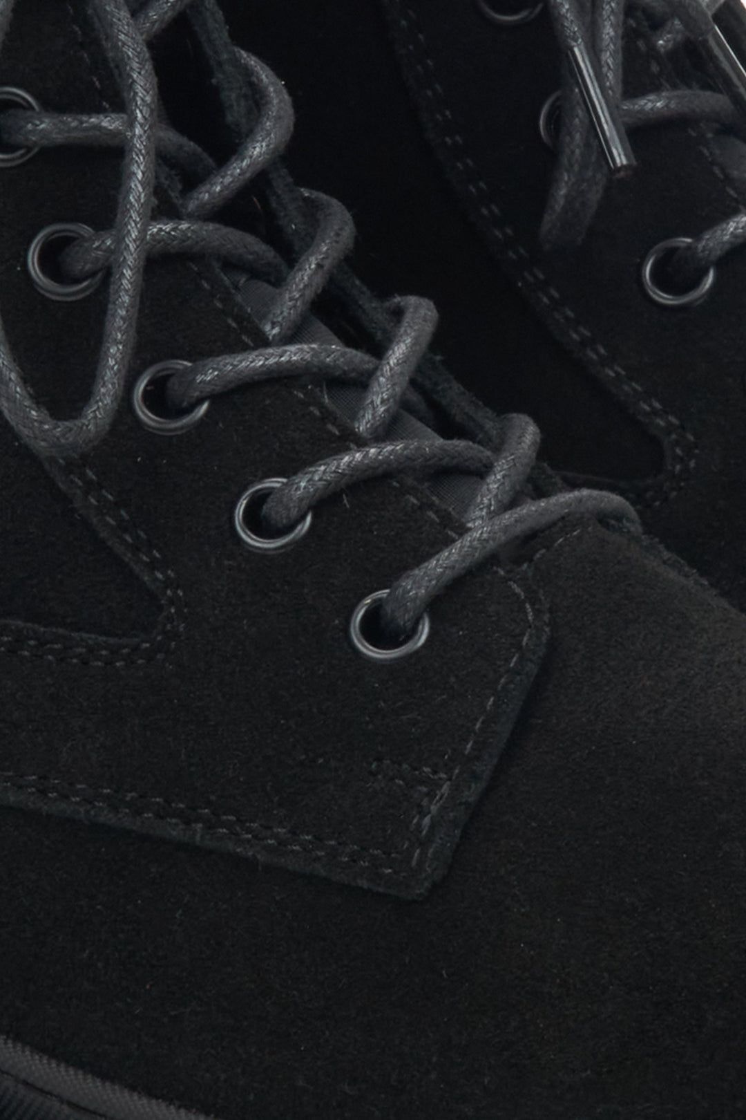 Black velour women's ankle boots by Estro - close-up of details.