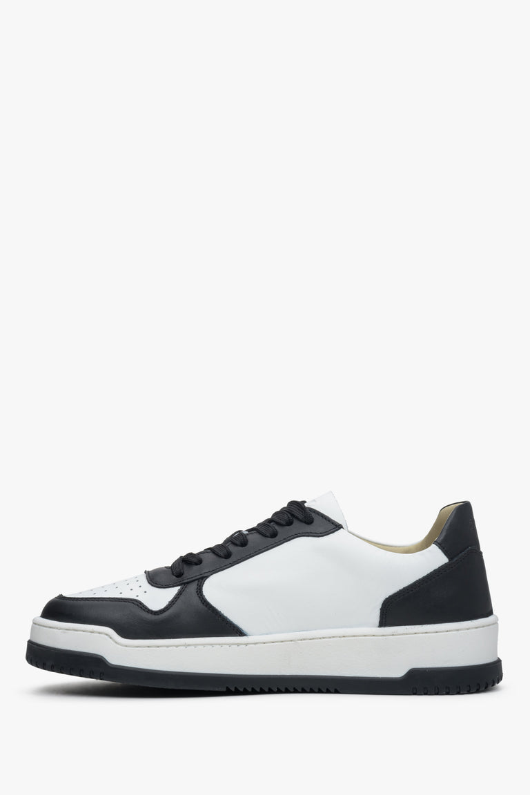 Women's sneakers made of natural leather in white and black color.