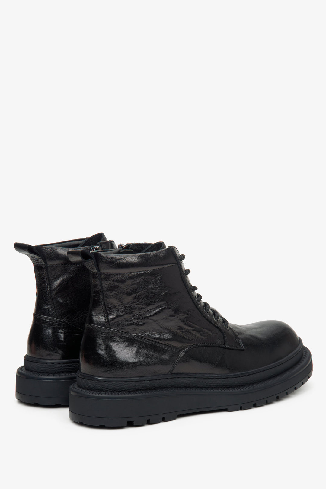 Men's black boots by Estro - heel counters and side profile of the shoe.