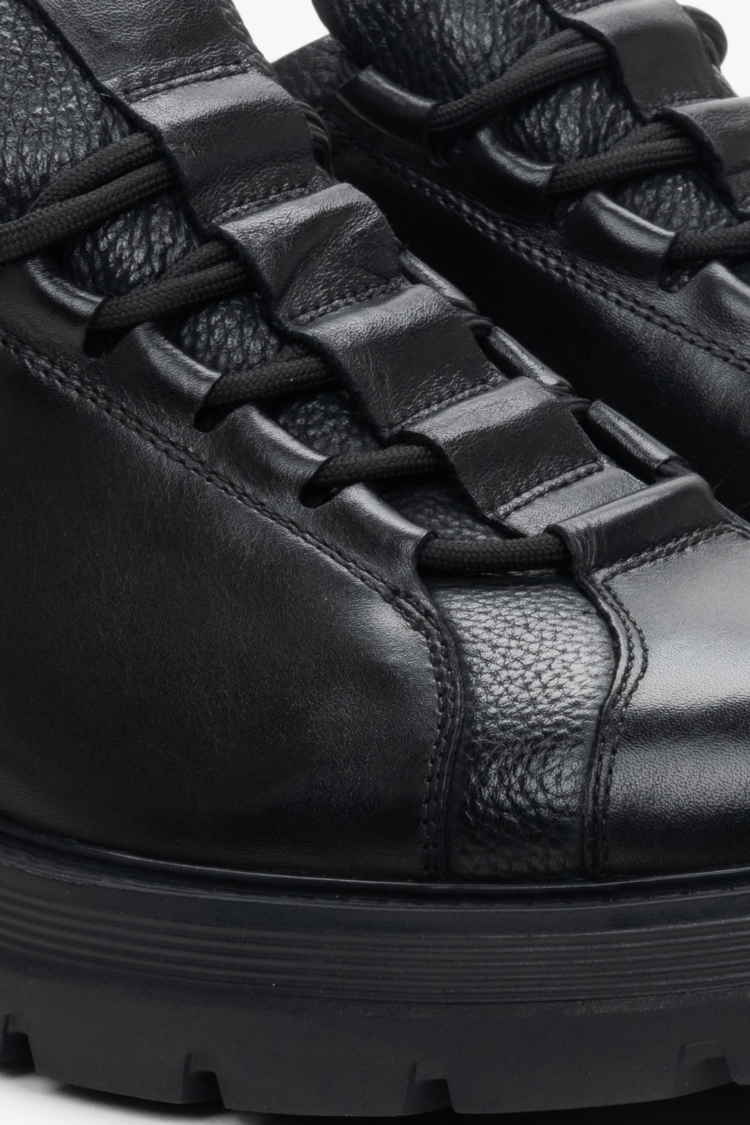 Men's black lace-up sneakers - close-up on details.
