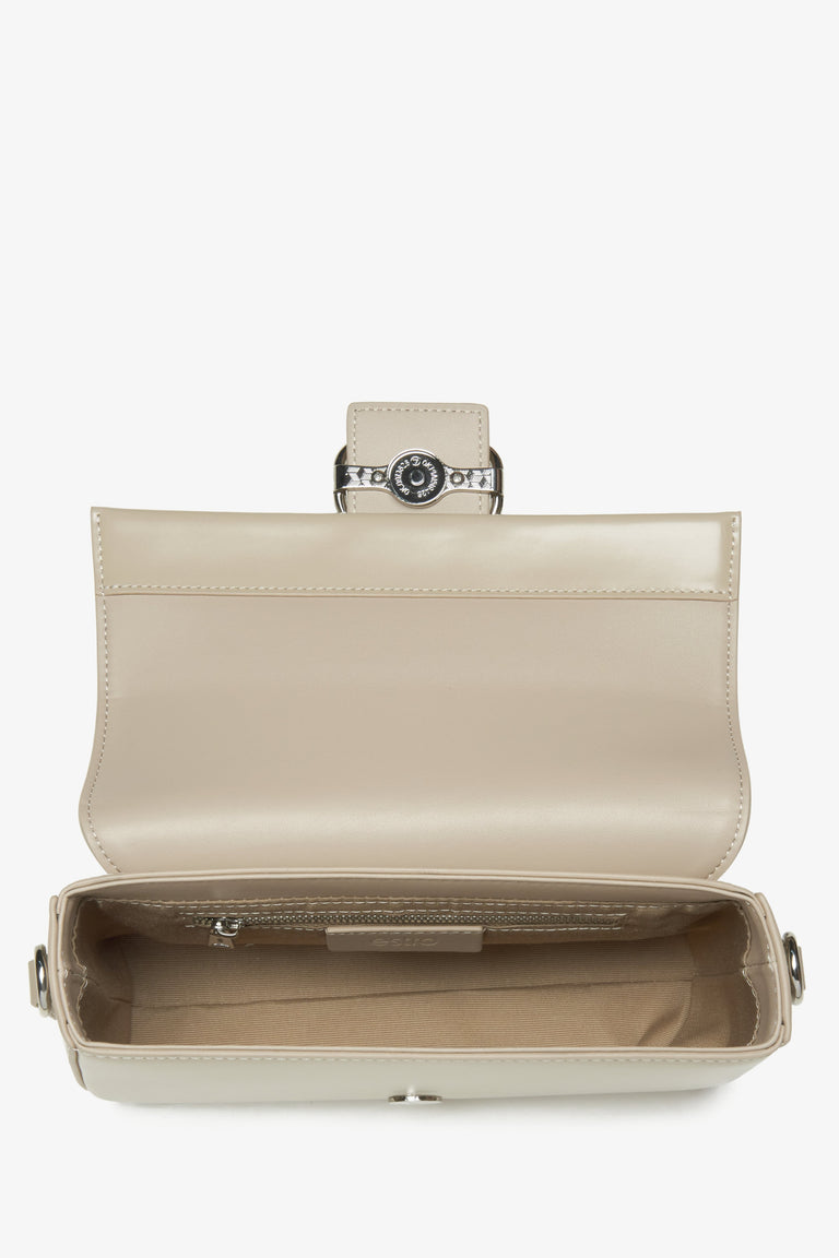 Beige leather women's bag - interior view.