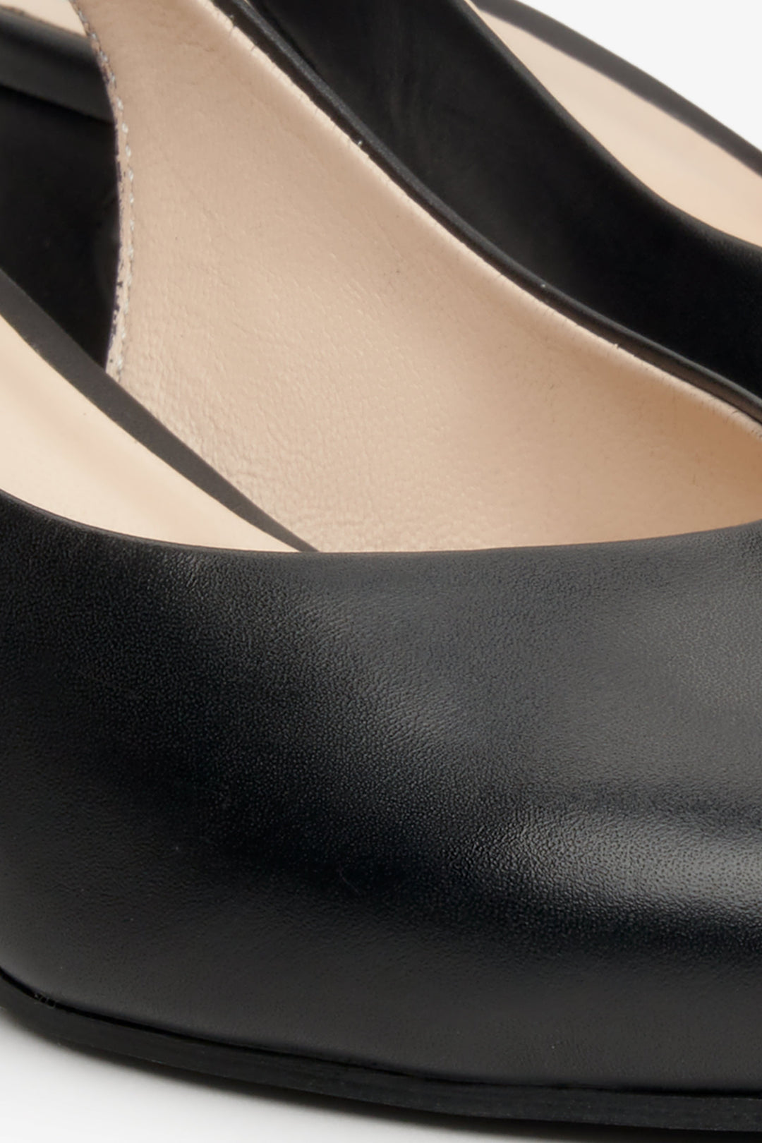 Women's black leather open-back pumps by Estro - close-up on the details.