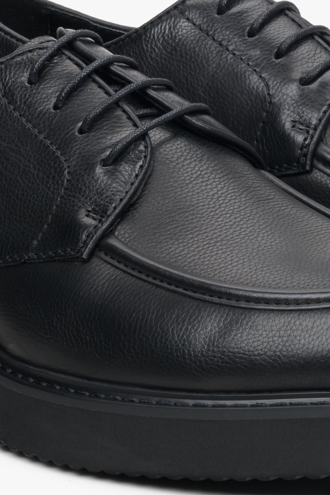 Men's black leather Estro brogues - close-up on the details.