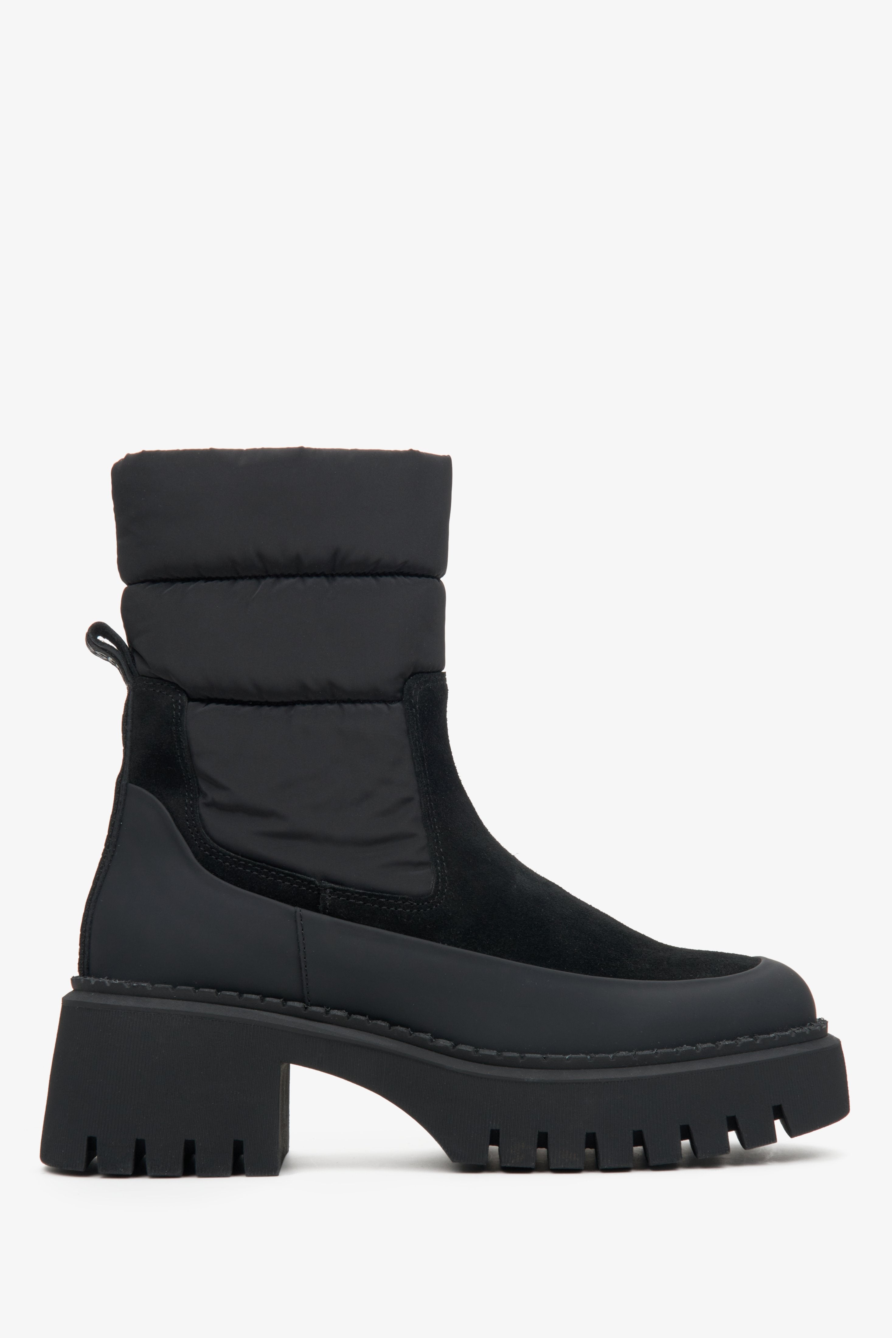 Women's black leather and velour ankle boots.