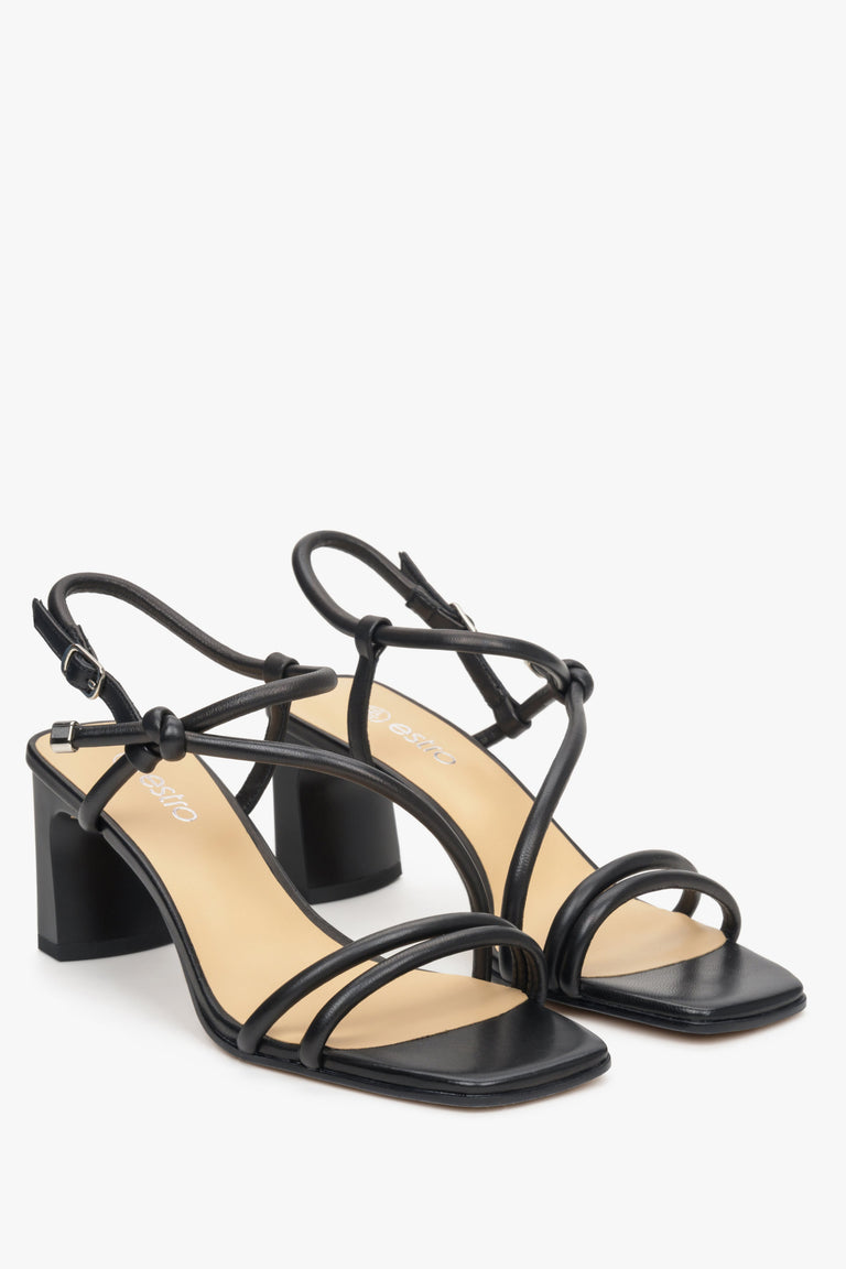 Heeled women's strappy sandals made of natural leather, black colour. 