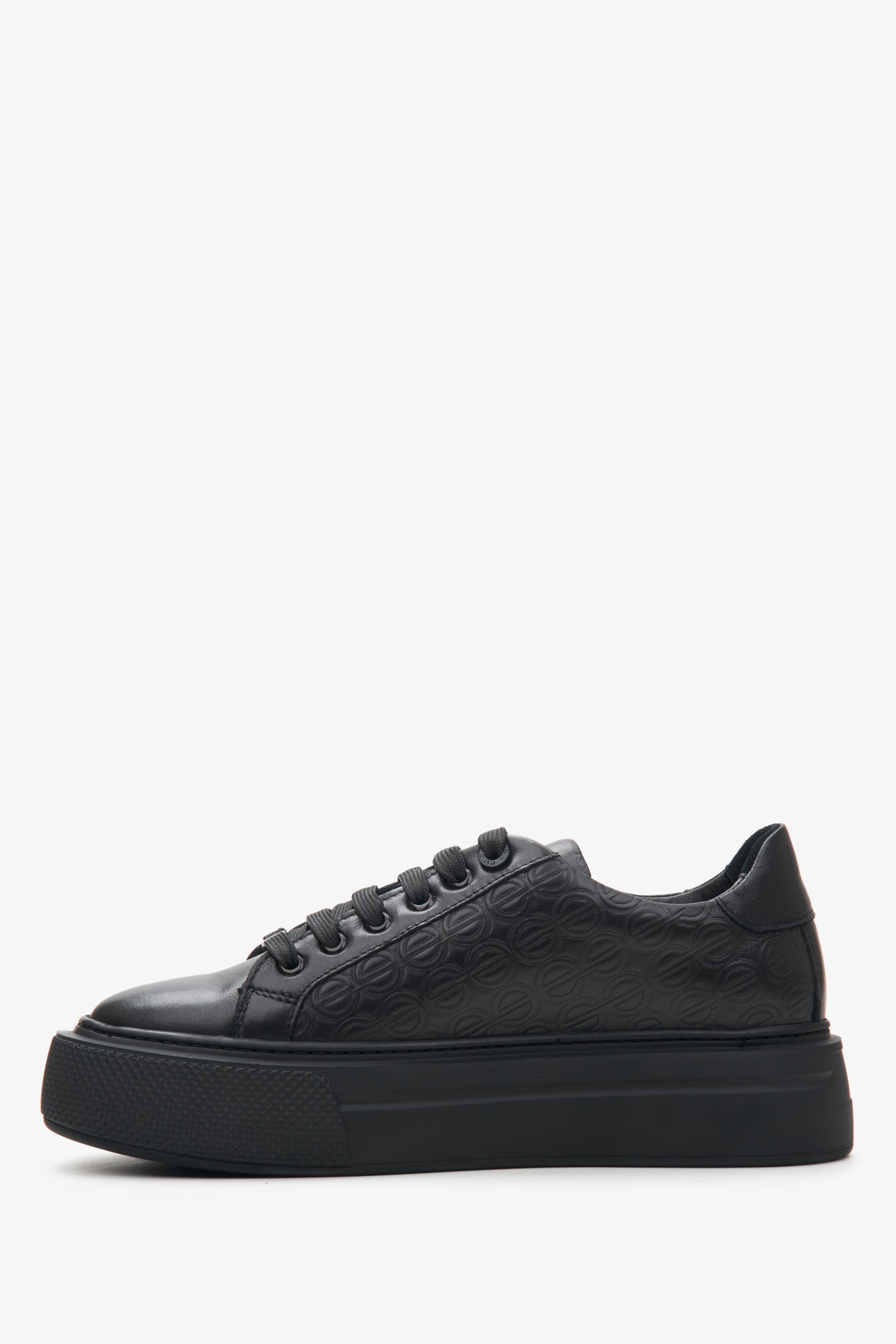 Women's black leather sneakers by Estro.