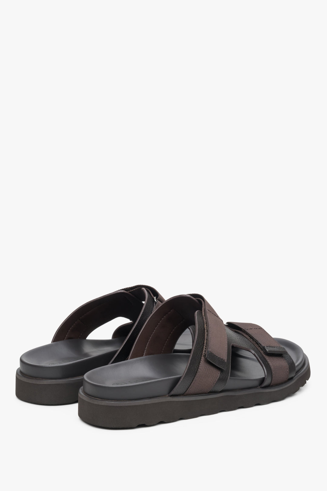 Men's dark brown leather sandals with textile elements - close-up on the toe line and heel line.