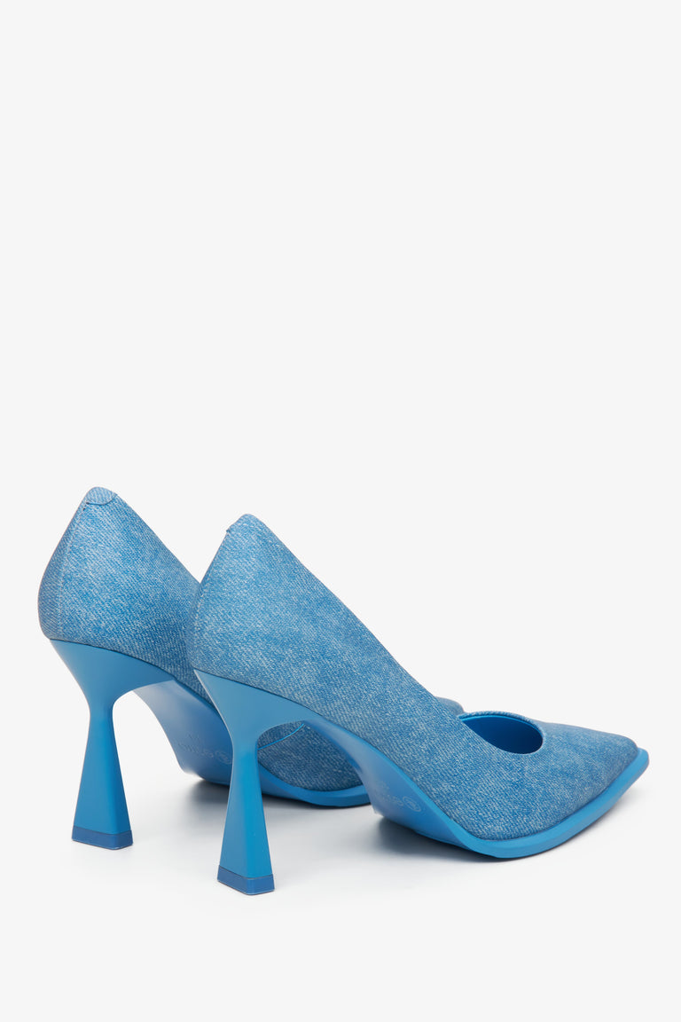 Women's blue denim pumps by Estro - close-up on the heel and side line of the shoes.