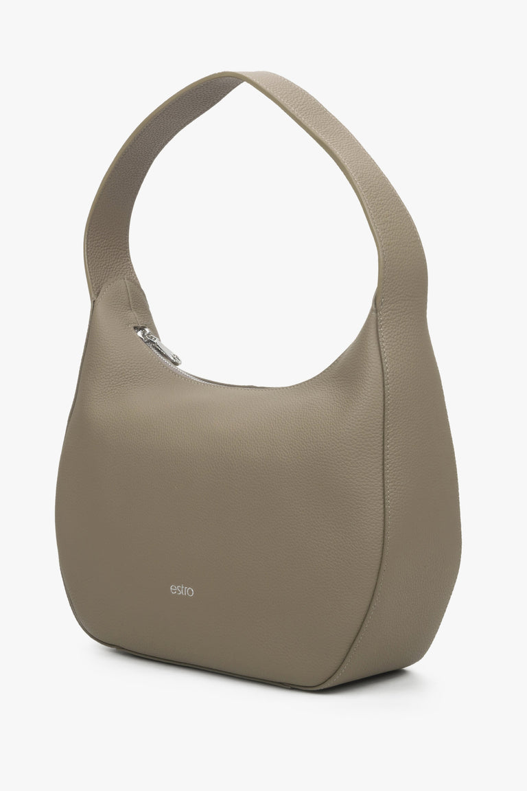 Women's crescent shaped shoulder bag made of genuine leather in brown and grey colour.