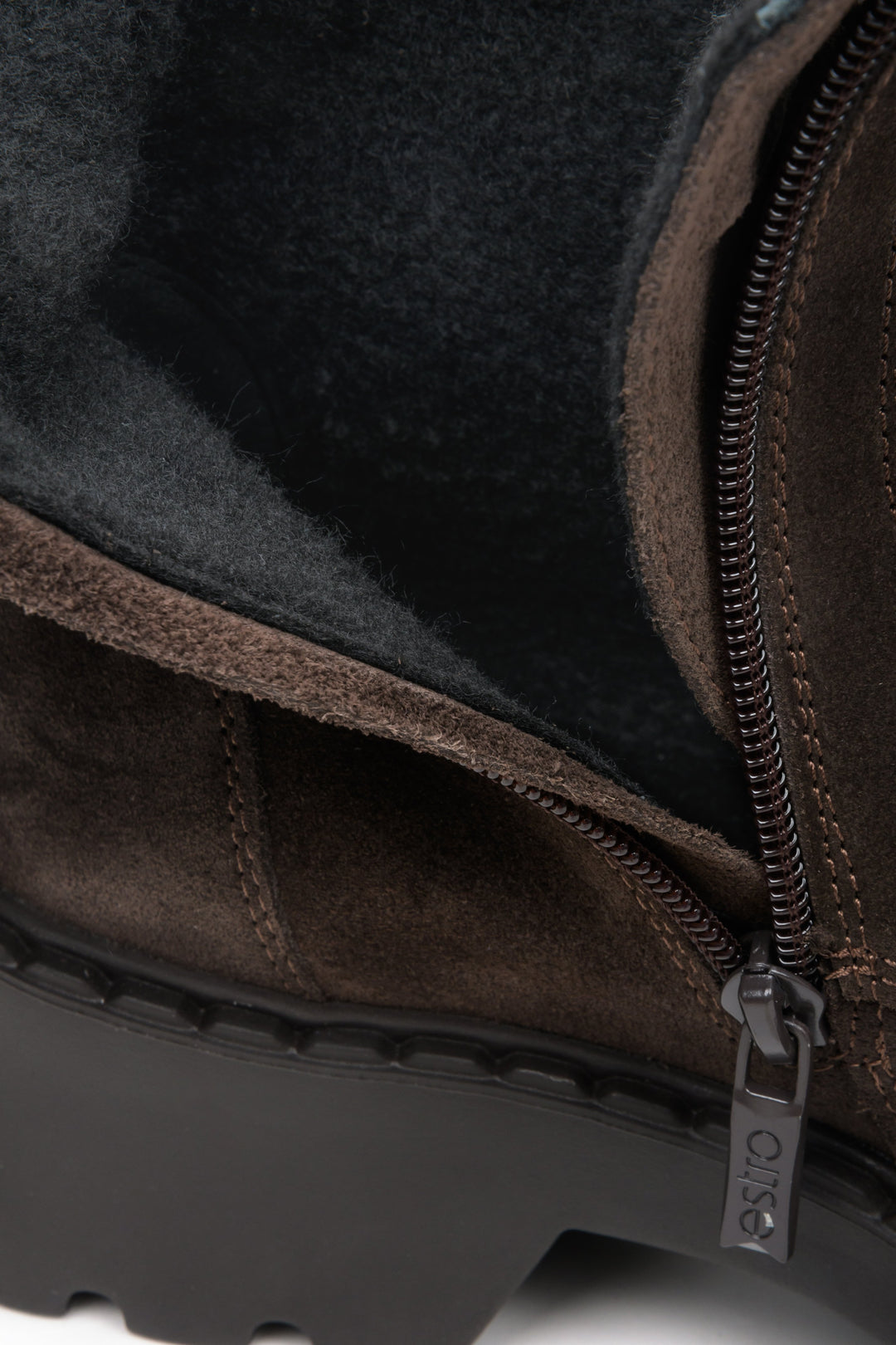 Women's dark brown velour work boots by Estro - close-up on the soft insole of the shoe.