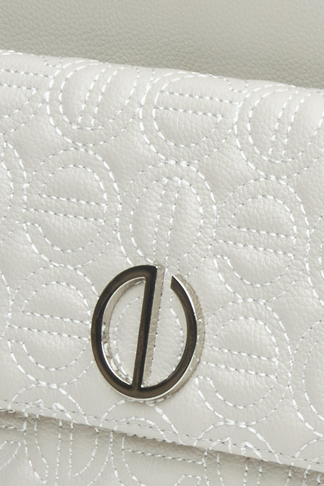 Light grey Estro women's backpack with silver hardware - close-up on details.