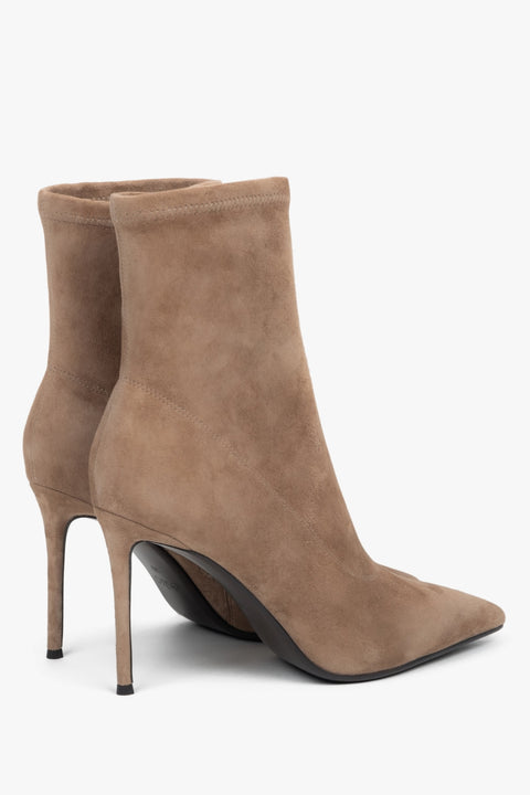 With stretch shaft, beige women’s ankle boots on high stiletto heel Estro.
