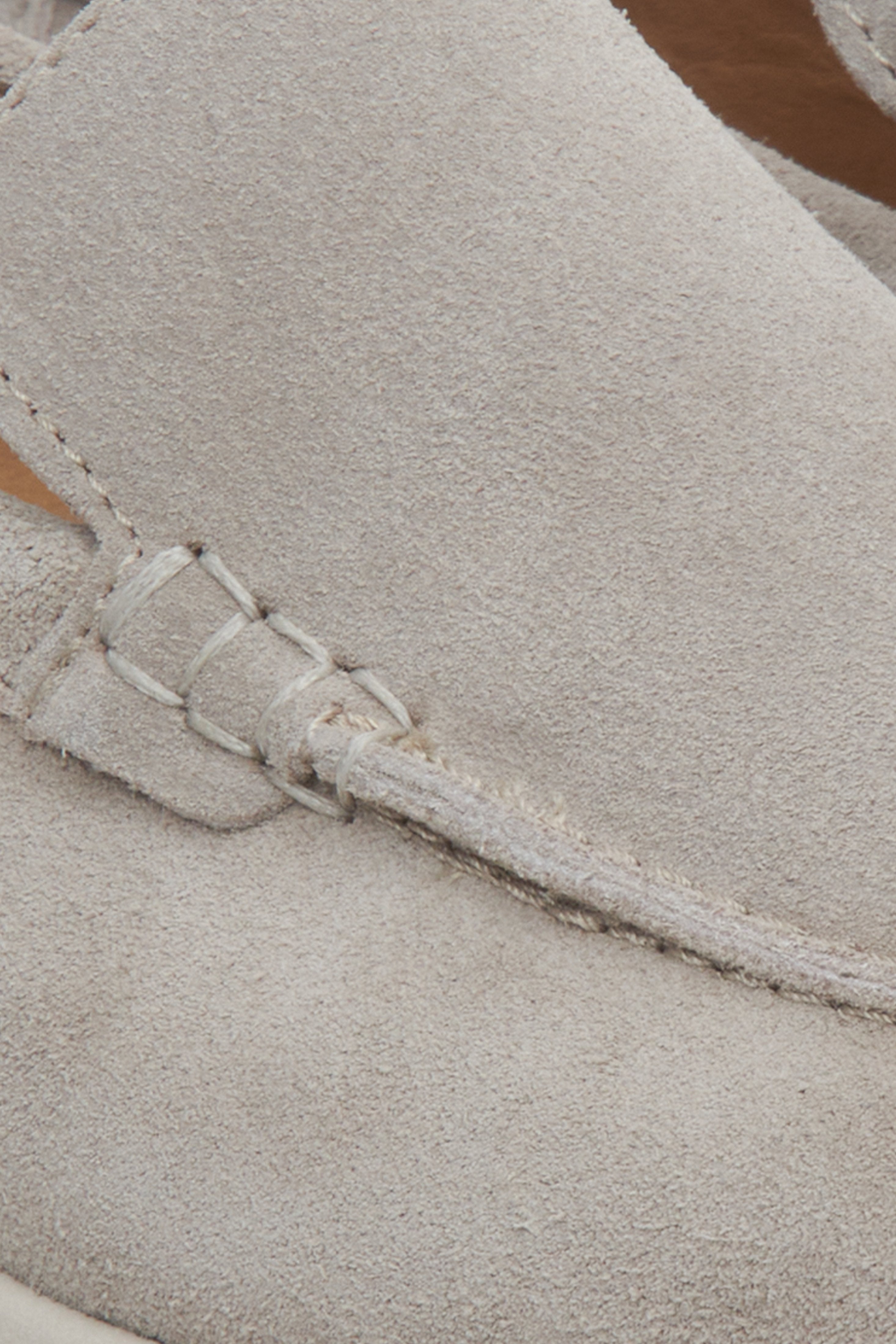 Women's loafers in light grey velour - close-up on details.