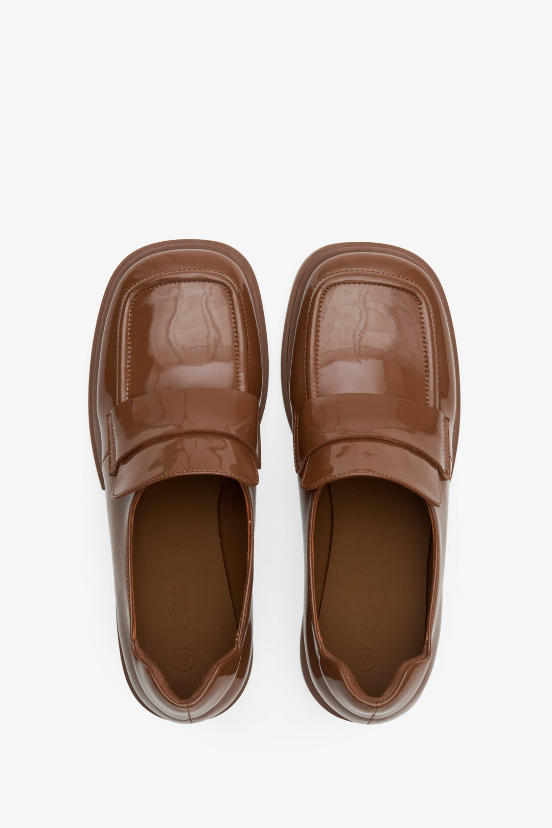 Women's leather, patent leather moccasins in brown by Estro - top view presentation of the model.