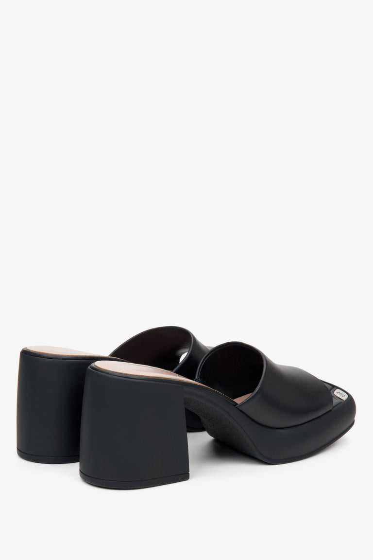 Women's black mules with a square heel - a close-up of the back of the shoes.