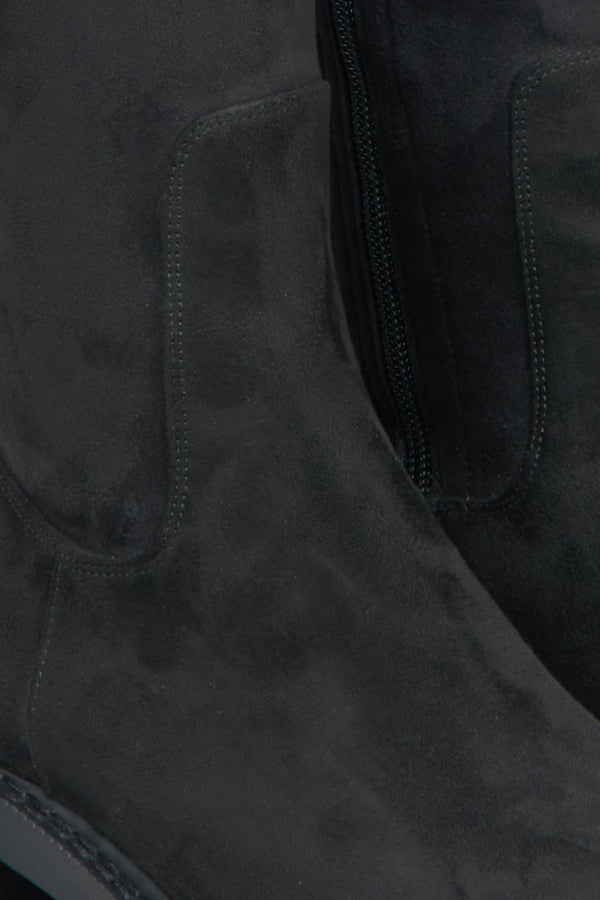 Women's black velour boots by Estro - close-up on the details.