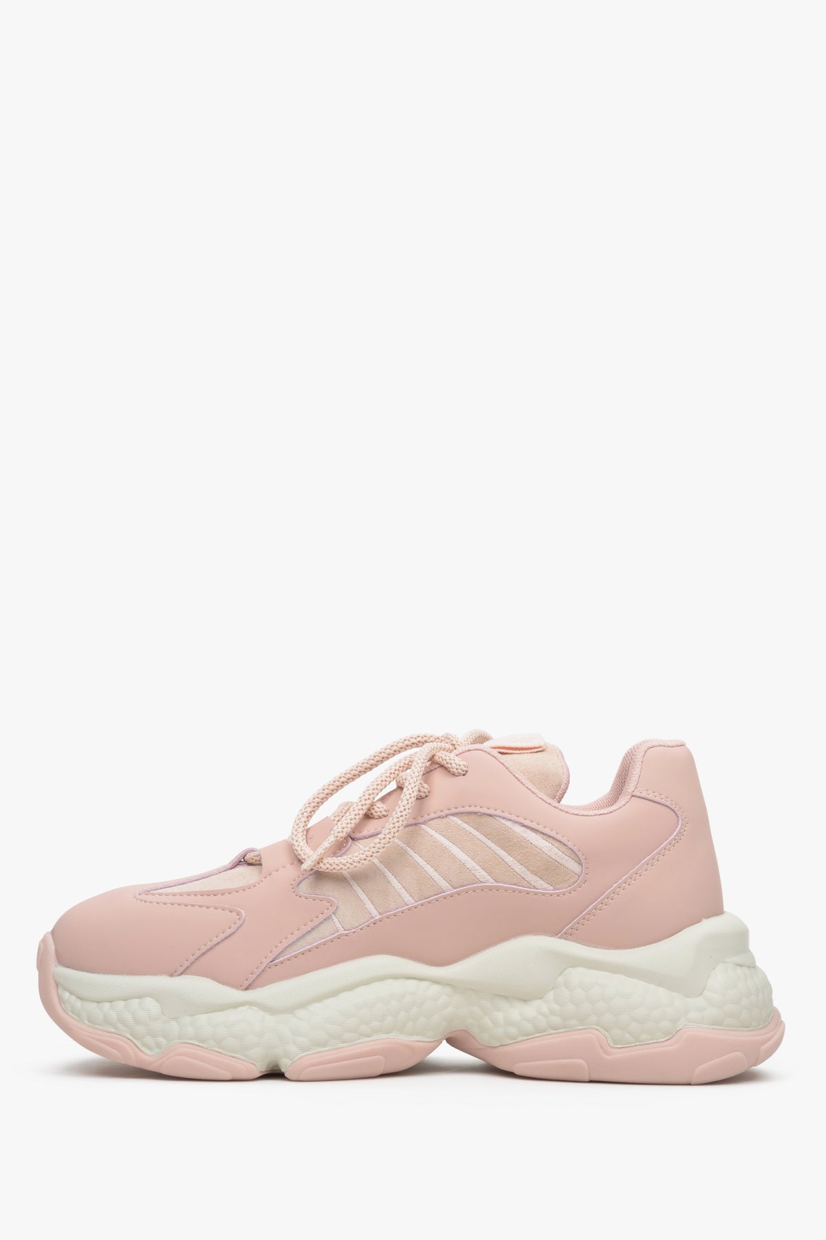 Suede-textile women's sneakers in light pink with laces on a thick sole - shoe profile.