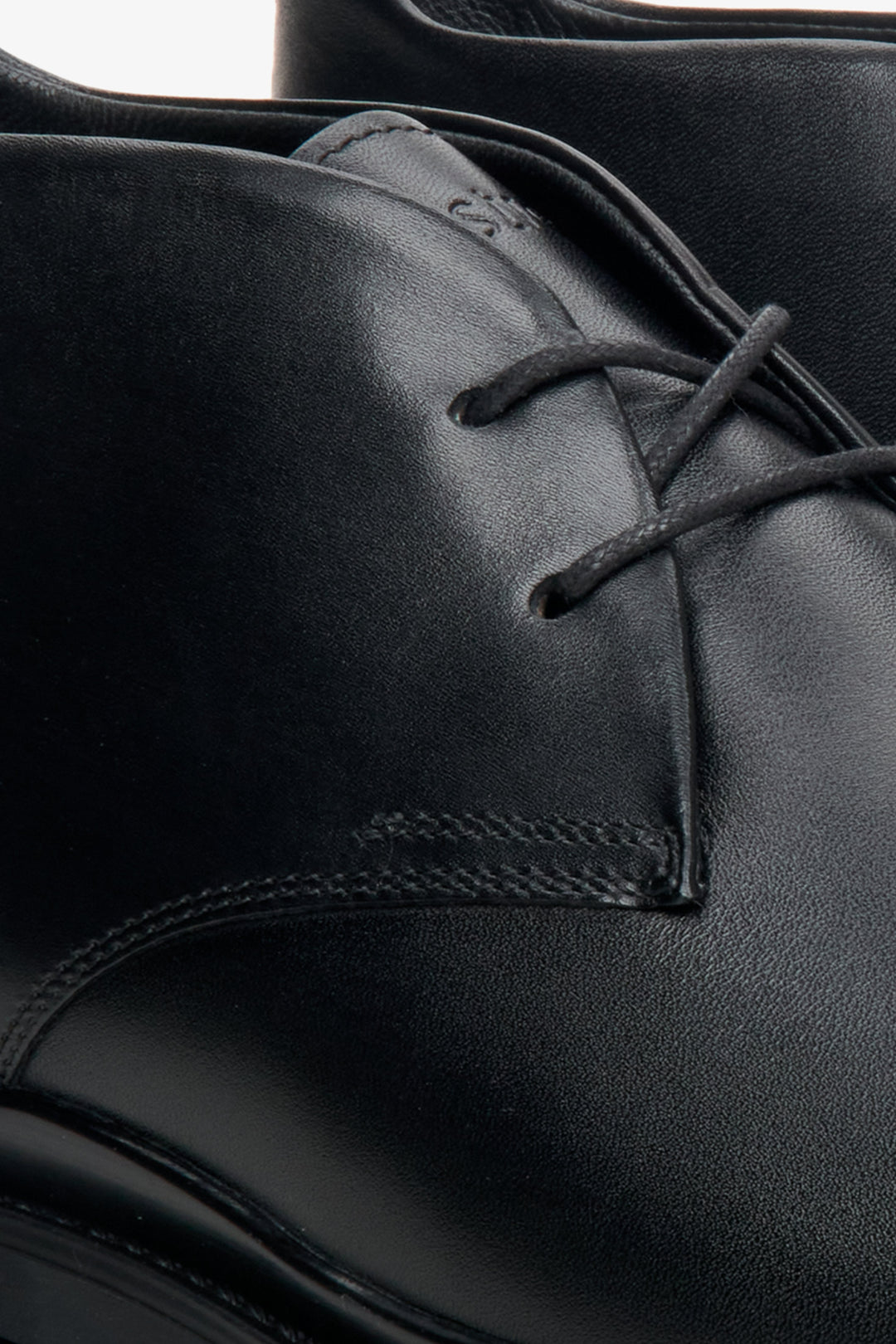 Men's black leather shoes by Estro - close-up on the details.