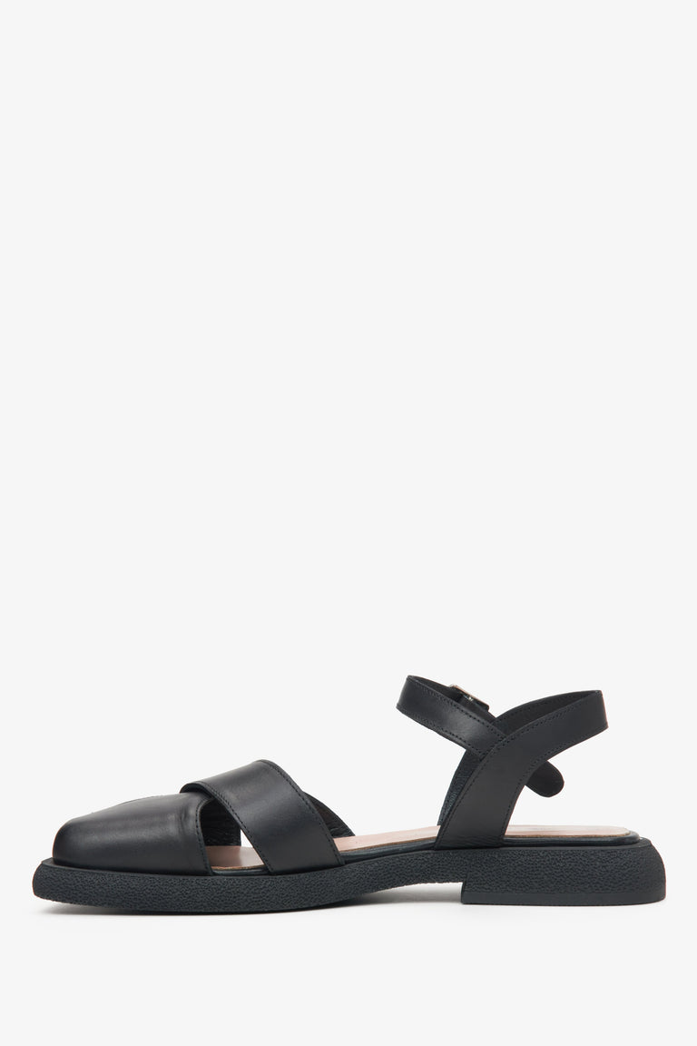Women's black leather sandals by Estro - shoe profile.