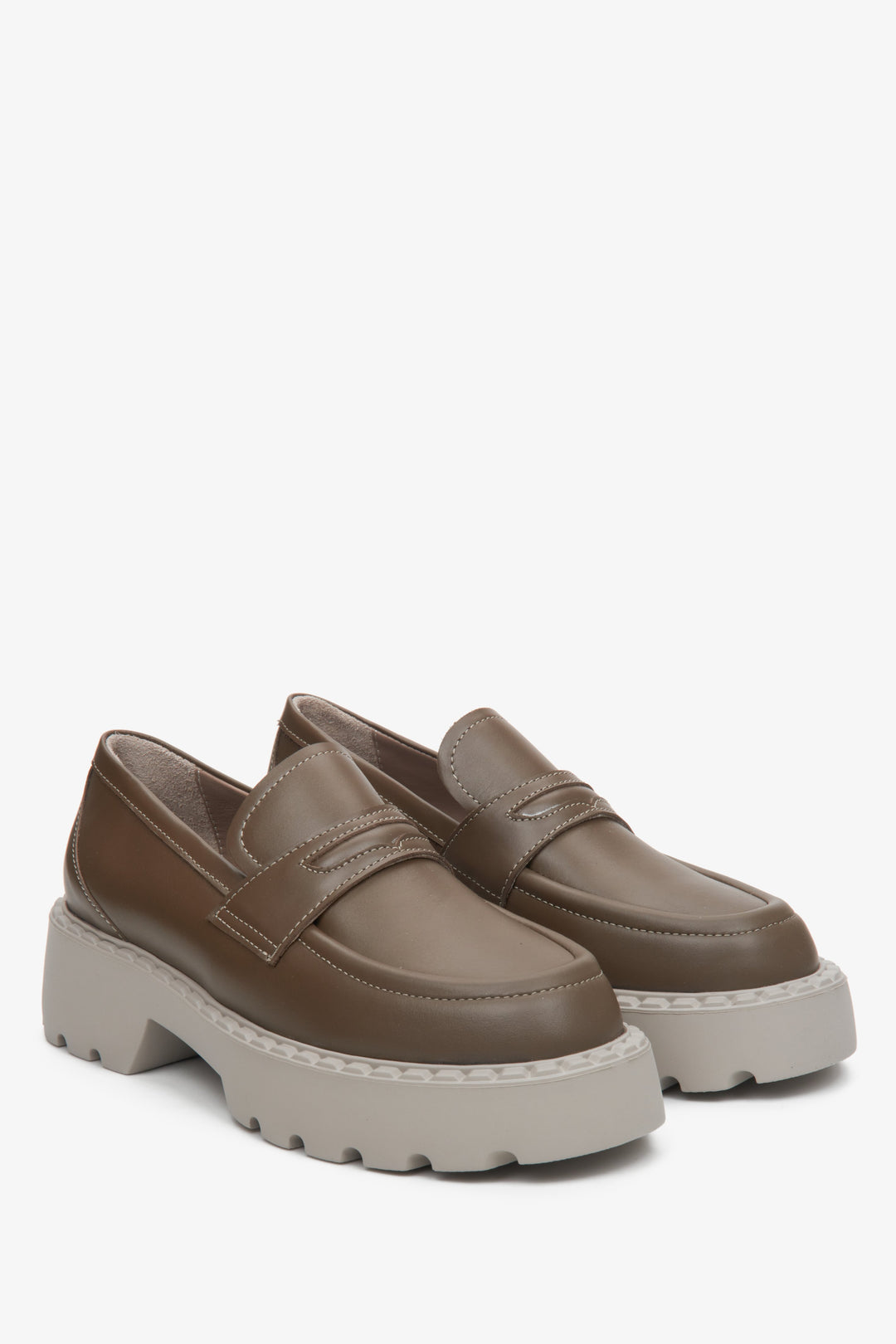 Stylish brown leather moccasins - displaying the shoes from the reverse angle.