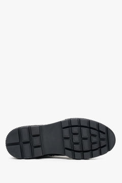 Women's black leather-textile boots by Estro - close-up on the sole.