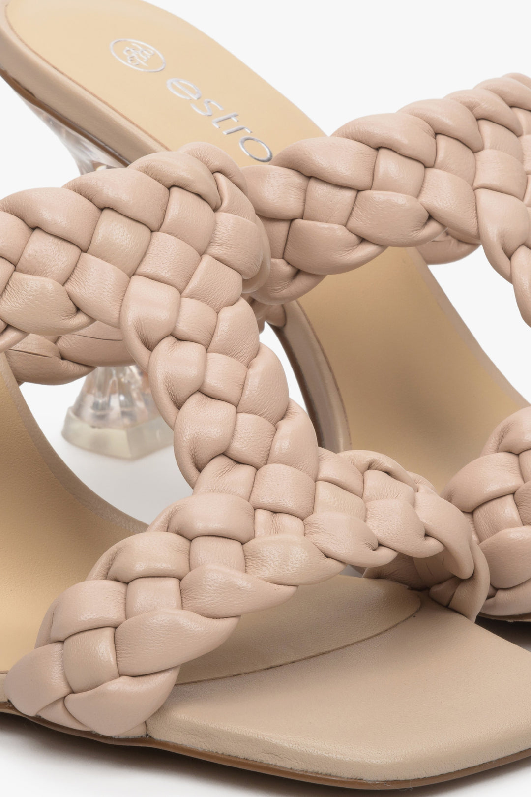 Women's beige leather heeled sandals - a close-up on details.