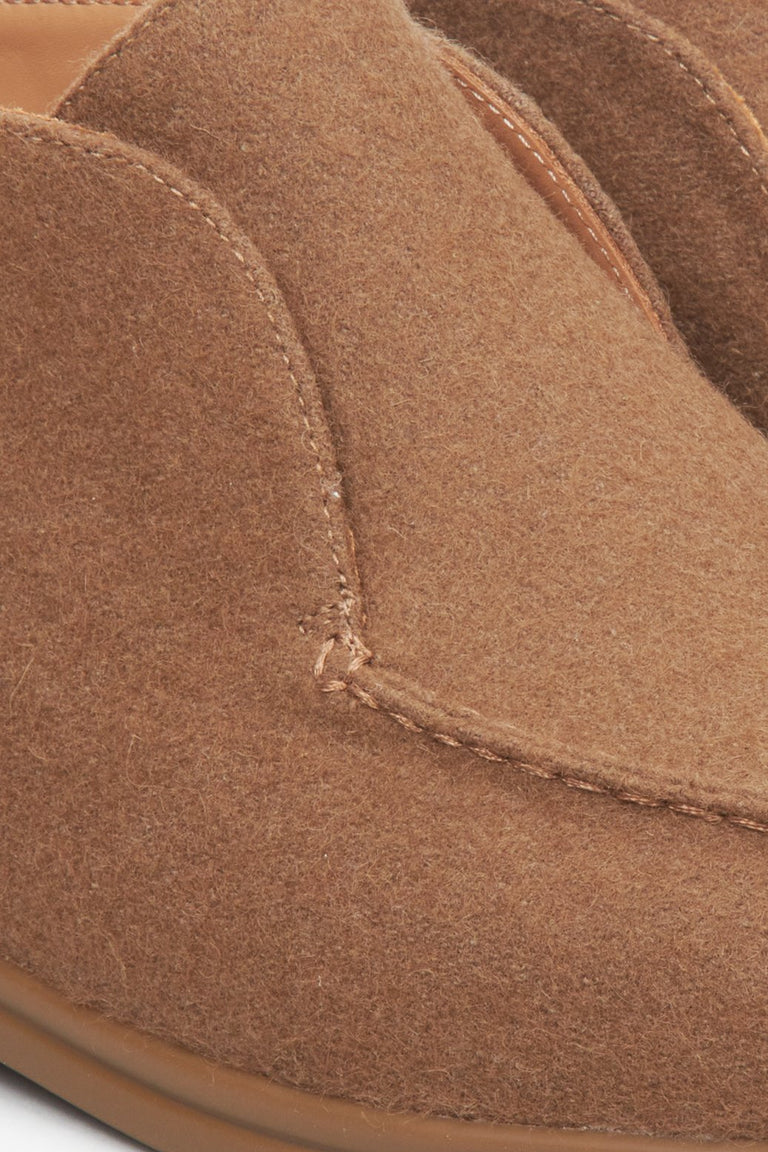 Women's brown moccasins by Estro - close-up on the detail.