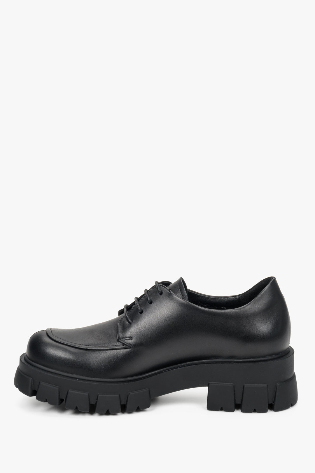 Women's black lace-up brogues made of genuine leather - shoe profile.