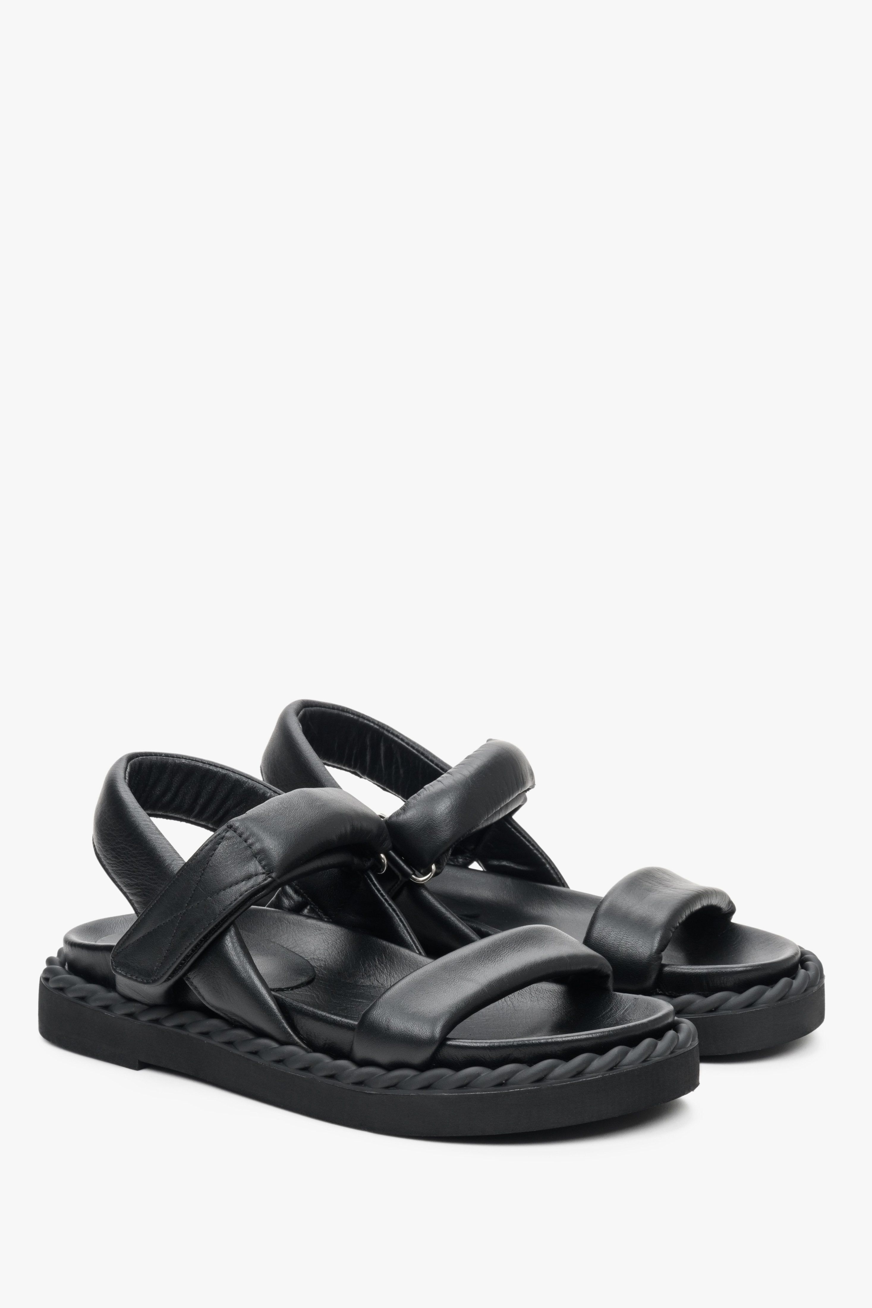 Women's sandals for summer in black colour made of natural leather on a comfortable sole.