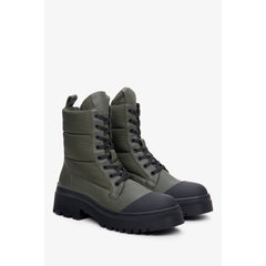 Green women's lace-up platform boots for winter.