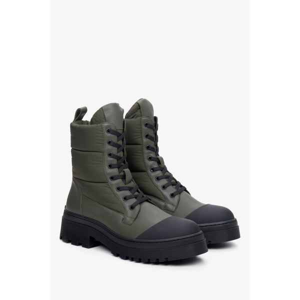 Green women's lace-up platform boots for winter.