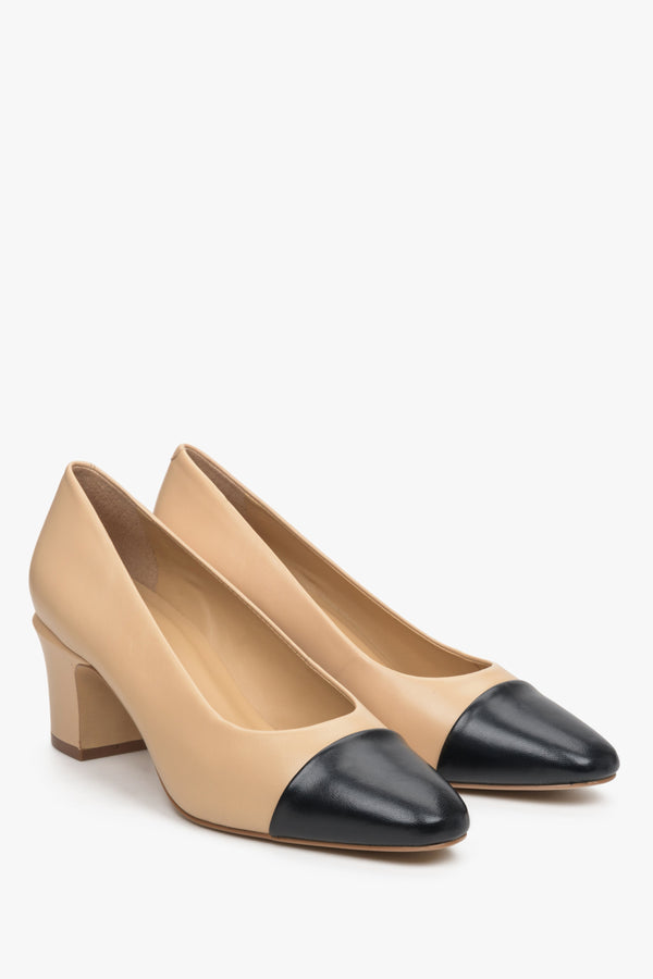 Women's beige pumps with a black toe and Estro high heels made of Italian genuine leather - a close-up of the shoe's toe.