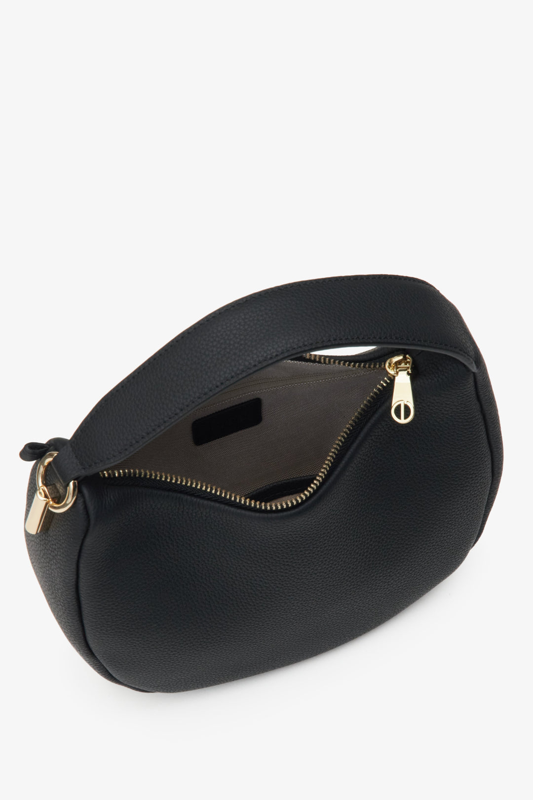 Close-up of the interior of the black leather women's crescent-shaped handbag by Estro.