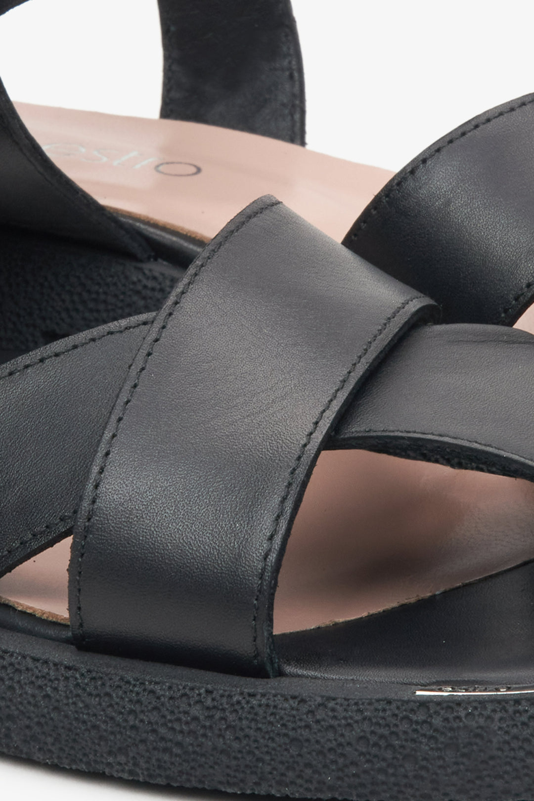 Women's black leather sandals by Estro - close-up on the details.
