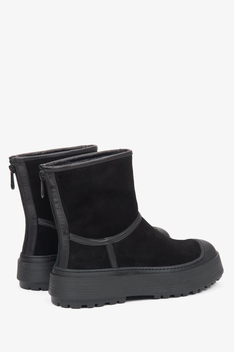 Women's black snow boots made of natural velour by Estro – close-up of the heel.