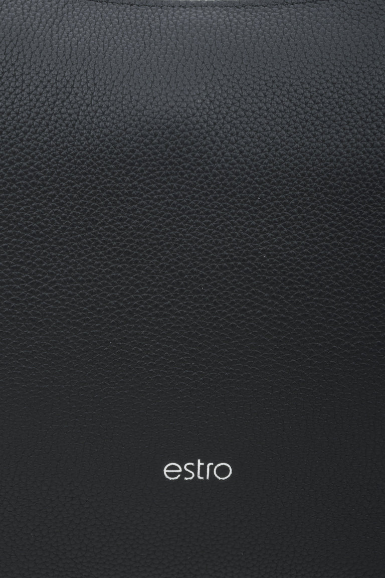 Women's black Estro crescent-shaped handbag made of genuine leather - close-up on the details.