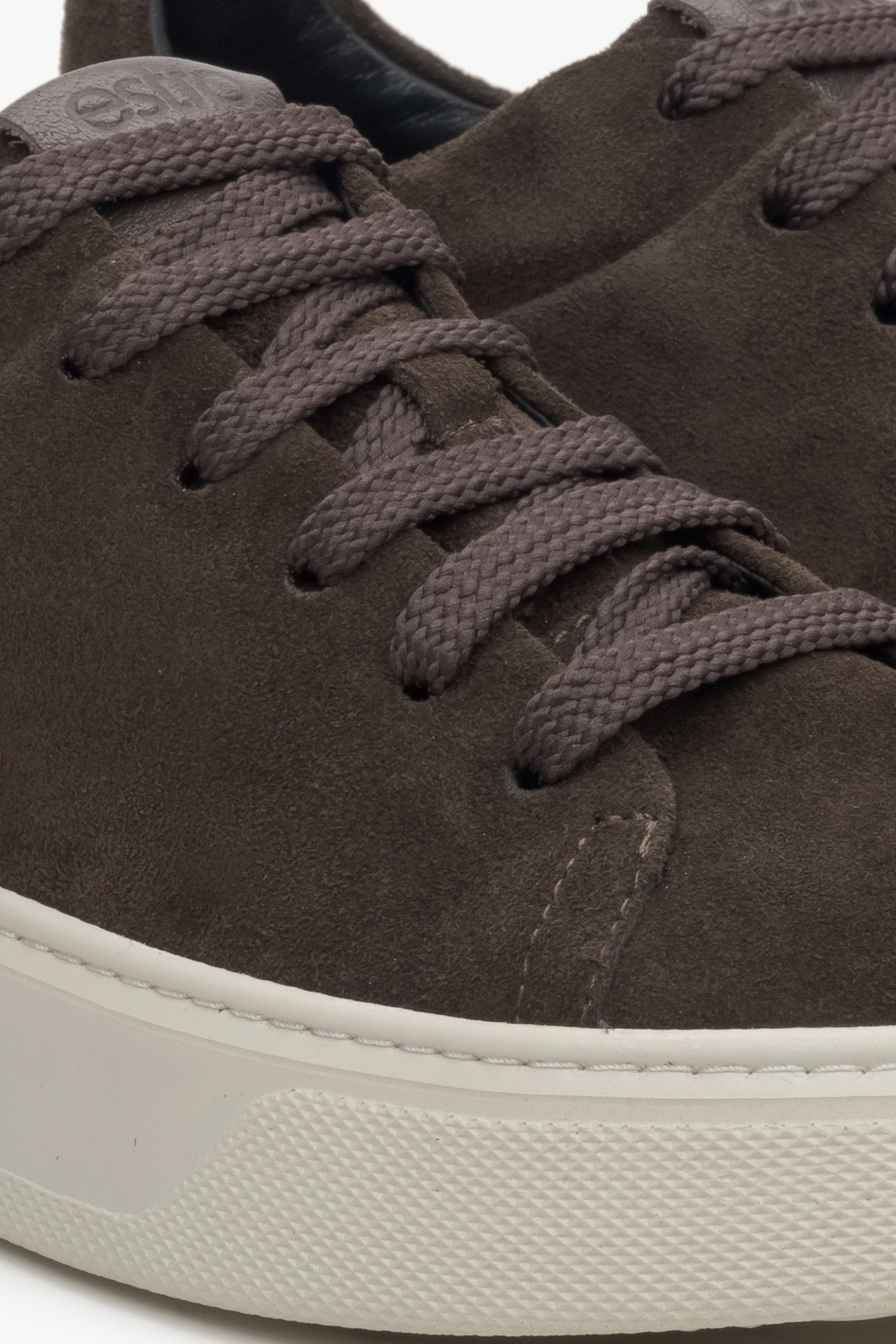 Women's dark brown sneakers made of natural velour by Estro - close-up on details.