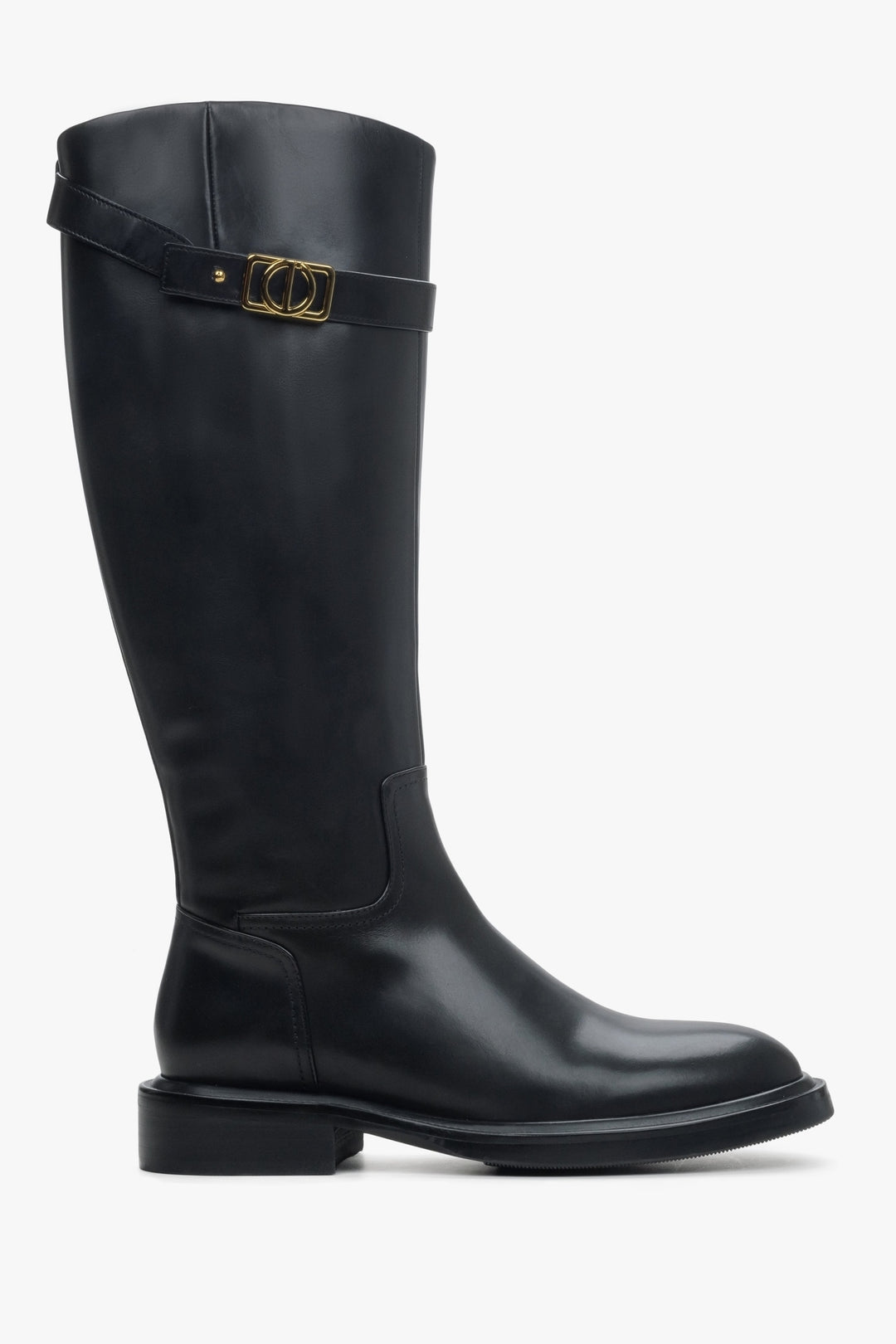 Women's black leather boots with decorative strap by Estro - shoe profile.