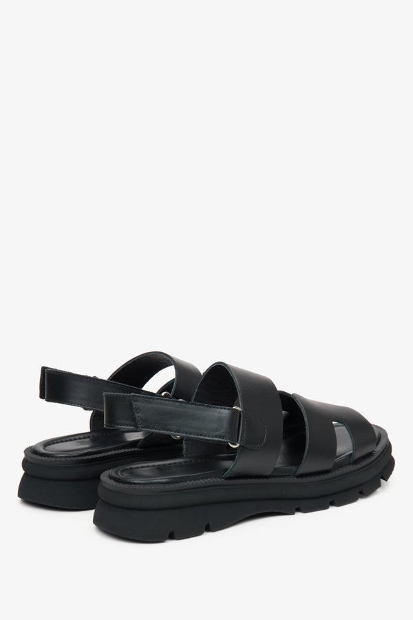 Women's black leather sandals by Estro - close-up on the heel.