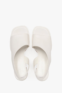 White leather women's sandals by Estro, perfect for everyday wear, featuring a subtle low heel – top view presentation.