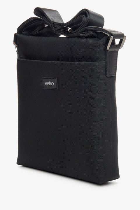 Men's black spacious bag by Estro - close-up on the side line of the model.