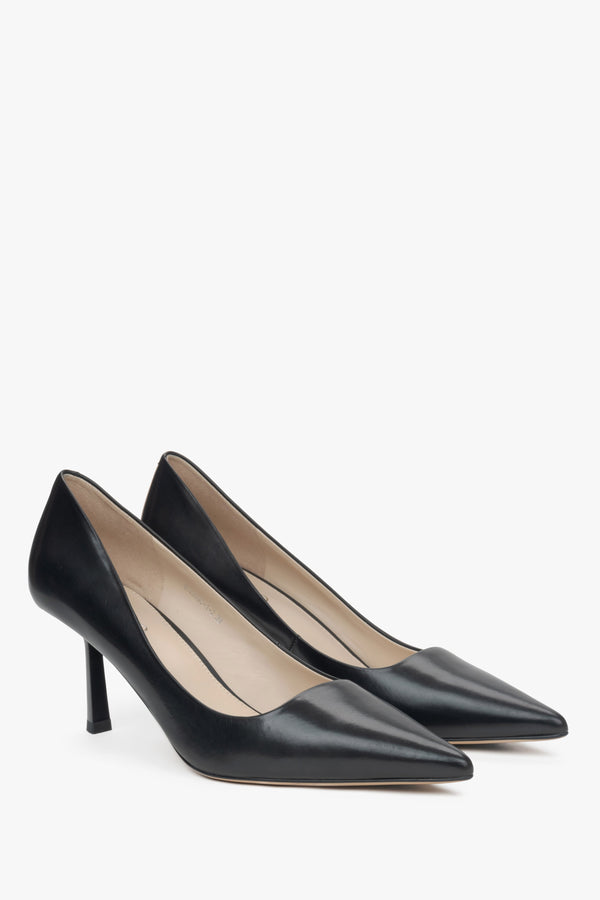 Women's black pumps with pointed toe on a stable heel.