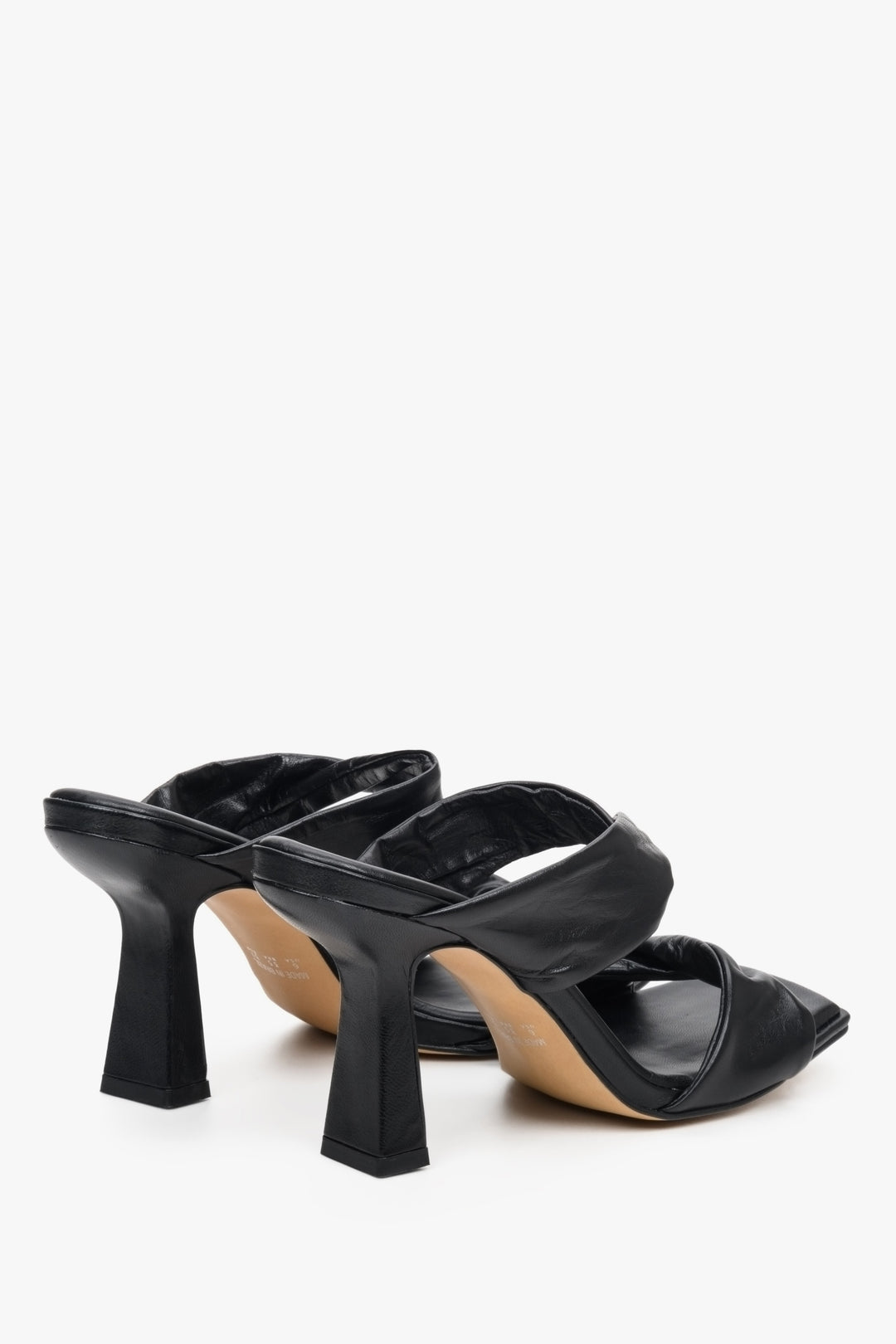 Women's black leather heeled sandals - close-up on the heel.