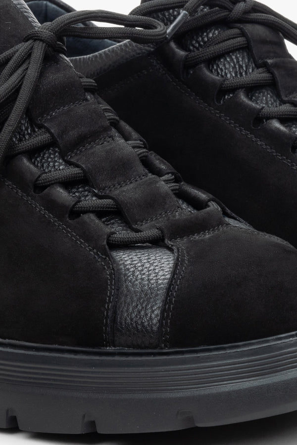 Men's black lace-up sneakers made of nubuck and leather - close-up on details.